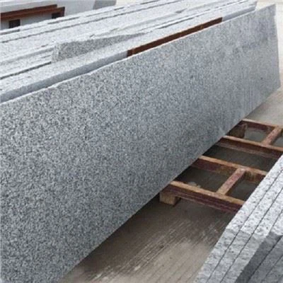 Dalles de granit blanc G602